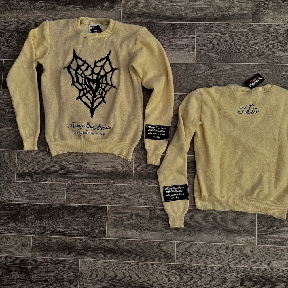 Cream Sweater with Black Spider Web Design